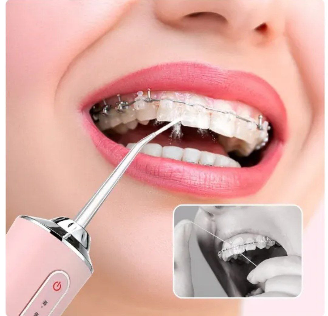 جهاز تنظيف الاسنان
