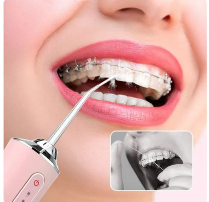 جهاز تنظيف الاسنان